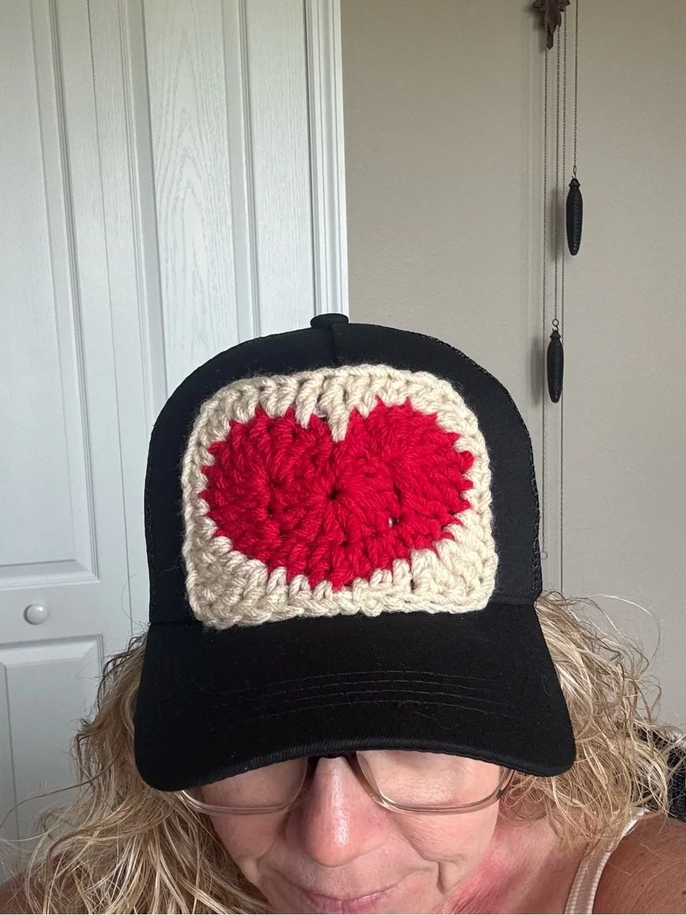 Black Trucker Hat with Red Crochet Heart Patch